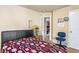 Bedroom with carpet and chair has access to an additional room, door, and window at 635 Crosswinds Cir, Marietta, GA 30008
