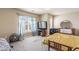 Bedroom featuring neutral walls, carpet, a window, a ceiling fan, and furniture at 635 Crosswinds Cir, Marietta, GA 30008