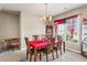 Traditional dining room featuring a chandelier, a large table, and natural light from a window at 635 Crosswinds Cir, Marietta, GA 30008