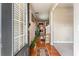Welcoming entryway featuring hardwood floors, neutral walls, and natural light, with staircase visible in the background at 635 Crosswinds Cir, Marietta, GA 30008