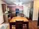 Eat-in kitchen features stainless steel appliances, wooden cabinets, granite countertops, and wood flooring at 635 Crosswinds Cir, Marietta, GA 30008