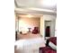 The sitting area includes a red chair, small brown table, and a white chaise lounge at 635 Crosswinds Cir, Marietta, GA 30008