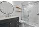 Modern bathroom featuring a glass enclosed shower, floating shelves, and a stylish vanity at 1250 Parkwood Se Cir # 3101, Atlanta, GA 30339