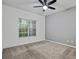 Bright bedroom featuring a ceiling fan and natural lighting at 1250 Parkwood Se Cir # 3101, Atlanta, GA 30339