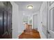 Inviting foyer with hardwood floors leads to a bright living space filled with natural light at 1250 Parkwood Se Cir # 3101, Atlanta, GA 30339