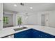 Stylish kitchen with a deep sink, bright cabinets and a dining area with large windows at 1250 Parkwood Se Cir # 3101, Atlanta, GA 30339