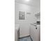 Functional laundry room with modern washer and dryer on patterned tile floor at 1250 Parkwood Se Cir # 3101, Atlanta, GA 30339