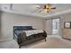 Serene bedroom with modern sliding barn door to a bathroom at 162 Greenbrier Way, Canton, GA 30114