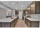 Well-lit kitchen with a spacious island and modern stainless steel appliances at 162 Greenbrier Way, Canton, GA 30114