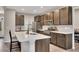 Modern kitchen with stainless steel appliances, white countertops, and sleek dark cabinets at 162 Greenbrier Way, Canton, GA 30114