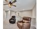 Spacious living room with ceiling fan and comfortable recliners at 162 Greenbrier Way, Canton, GA 30114