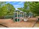 Community playground with climbing structures and slides, nestled in a secure and well-maintained area at 162 Greenbrier Way, Canton, GA 30114