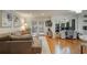 Bright living room featuring hardwood floors, modern decor, and sliding doors to the outdoors at 25 Ivy Gates Ne, Atlanta, GA 30342