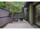 Private patio with comfortable seating and a small fire pit, perfect for relaxing outdoors at 25 Ivy Gates Ne, Atlanta, GA 30342