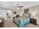 Bedroom featuring a decorative iron bed, floral bedding, complemented by wood furnishings at 4702 Sequoia Sw Dr, Lilburn, GA 30047