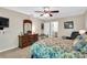 Bedroom boasting natural light with a decorative bed frame, floral bedding, and coordinated wood furnishings at 4702 Sequoia Sw Dr, Lilburn, GA 30047