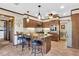 Spacious kitchen with granite counters, stainless appliances, a breakfast bar, and natural light at 4702 Sequoia Sw Dr, Lilburn, GA 30047