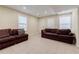 Inviting basement featuring a comfortable sofa, large windows, and plenty of natural light at 5105 Davidson Ne Rd, Marietta, GA 30068