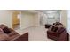 Open-plan basement with a cozy seating area and a convenient kitchenette setup at 5105 Davidson Ne Rd, Marietta, GA 30068