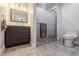 Modern bathroom featuring a glass-enclosed shower, sleek vanity, and contemporary finishes for a clean, stylish look at 5105 Davidson Ne Rd, Marietta, GA 30068