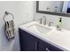 Close-up of a modern bathroom sink and vanity with a stylish faucet, ample countertop space, and decorative accents at 5105 Davidson Ne Rd, Marietta, GA 30068