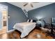 Cozy bedroom featuring a comfortable bed, desk, and workspace, ideal for relaxation and productivity at 5105 Davidson Ne Rd, Marietta, GA 30068