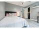 Serene bedroom with soft gray walls and a well-lit, open closet at 5105 Davidson Ne Rd, Marietta, GA 30068