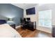 Bright bedroom featuring a desk, chair and computer, offering a comfortable space to work from home at 5105 Davidson Ne Rd, Marietta, GA 30068