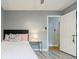 Relaxing bedroom with a cozy atmosphere and a well-lit doorway at 5105 Davidson Ne Rd, Marietta, GA 30068