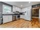 Bright kitchen equipped with stainless steel appliances and a view of the dining room at 5105 Davidson Ne Rd, Marietta, GA 30068