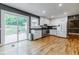 Well-lit kitchen with stainless steel appliances and sliding glass doors at 5105 Davidson Ne Rd, Marietta, GA 30068