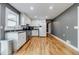 Functional kitchen featuring white cabinets, stainless steel appliances, and ample counter space at 5105 Davidson Ne Rd, Marietta, GA 30068