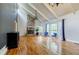 Living room features vaulted ceilings, stone fireplace, hardwood floors, and natural light at 5105 Davidson Ne Rd, Marietta, GA 30068