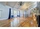 Spacious living room featuring vaulted ceilings, hardwood floors, and large windows at 5105 Davidson Ne Rd, Marietta, GA 30068