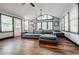 Bright living room featuring vaulted ceilings, numerous windows, and comfortable seating at 5105 Davidson Ne Rd, Marietta, GA 30068