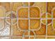 Close-up showcasing intricately designed, light brown and dark brown patterned tiles at 5105 Davidson Ne Rd, Marietta, GA 30068