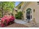 Beautiful front yard showcases lush landscaping, a well-manicured lawn, and a charming walkway at 1824 Mallard Lake Dr, Marietta, GA 30068