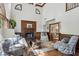 Bright living room with high ceilings, fireplace, and hardwood floors, featuring comfortable seating at 1824 Mallard Lake Dr, Marietta, GA 30068