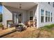 Backyard patio area with fire pit and lawn at 233 Hampton Station Blvd, Canton, GA 30115