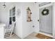 Welcoming front porch with rocking chairs, decor and curb appeal at 233 Hampton Station Blvd, Canton, GA 30115