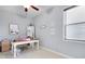 Bright office with desk, shelves, and window, ideal for work or study at 233 Hampton Station Blvd, Canton, GA 30115