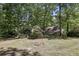 Enjoy this home with a private, large, and wooded backyard at 1390 Barclay Dr, Lawrenceville, GA 30043