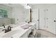 Well-maintained bathroom with dual sinks, large mirror, and ample storage space at 1390 Barclay Dr, Lawrenceville, GA 30043