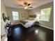 Comfortable and inviting bedroom with ample natural light, stylish furnishings, and a relaxing ambiance at 1900 Meadow Ln, Decatur, GA 30032