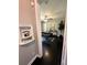View into bedroom with dark hardwood floors and decor at 1900 Meadow Ln, Decatur, GA 30032