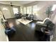 Bright living room with dark hardwood floors, modern furniture and plenty of natural light at 1900 Meadow Ln, Decatur, GA 30032