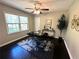 Well-lit home office space with a decorative rug, ample natural light, and modern decor elements at 1900 Meadow Ln, Decatur, GA 30032
