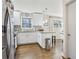 Updated kitchen boasts granite countertops, stainless steel appliances, and an eat-in bar at 409 Katherine Ln, Woodstock, GA 30189