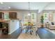 Cozy breakfast nook next to kitchen, bathed in natural light, adjacent to living area at 120 Park Village Dr, Canton, GA 30114