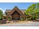 Attractive community center with stone accents, manicured landscaping, and inviting entrance at 120 Park Village Dr, Canton, GA 30114